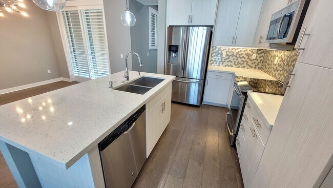Building Photo - Coming Soon! Modern Tri-Level Smart Townho...