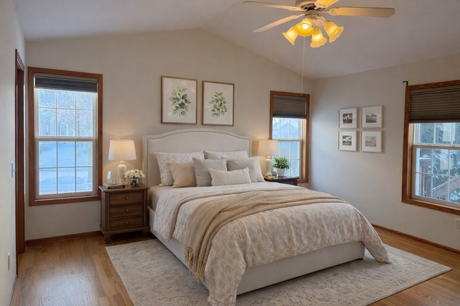 Building Photo - Spacious 3BR/3BA Condo with Finished Basement + 2-Car Garage — Available Now