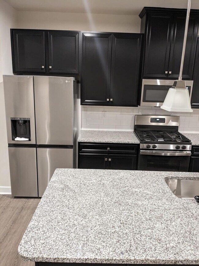 Building Photo - Three-Story Townhome