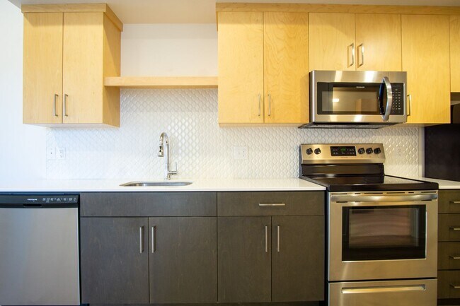 Building Photo - SUMMER SPECIAL: Top Floor Modern 2 Bdr w/ W&D + AC!