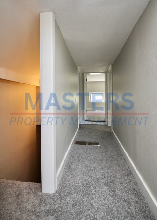 Building Photo - Three bedroom with 1 and a half bath tradi...