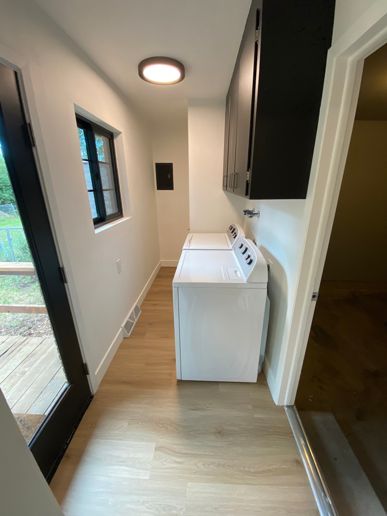 laundry rm, doors to deck and garage - 1108 Constitution Ave