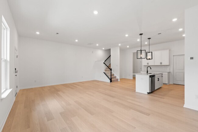 Building Photo - Welcome home to this stunning brand-new townhome in one of Indian Trail's newest and most desirab...