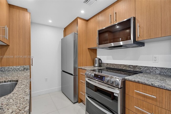 Building Photo - 10275 Collins Ave