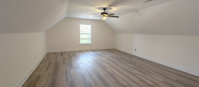 Building Photo - 5-bedroom home with 3 car garage and fully...