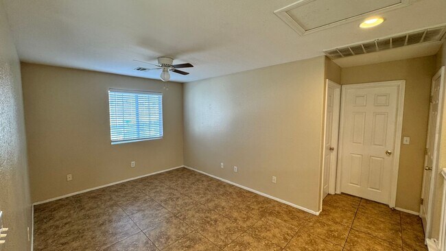 Building Photo - Gated 3 BDRM Master BDRM downstairs
