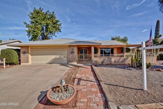 Building Photo - 10933 W Tropicana Cir