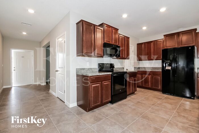 Building Photo - 10111 Paradise Fish Dr