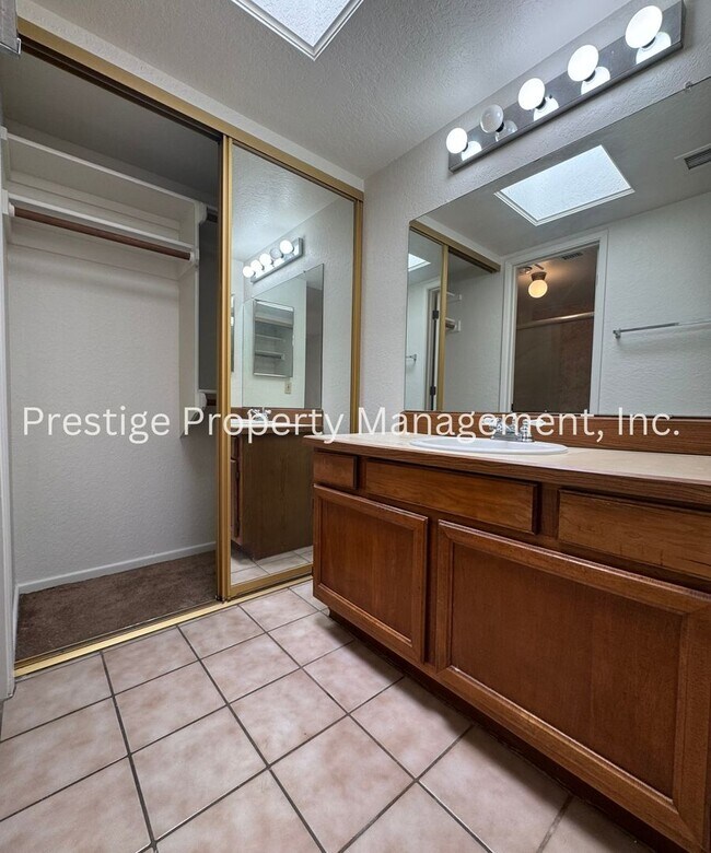 Building Photo - Totaling 3/3 With The Guest House; This Lovely Central Townhome is Everything You Need!