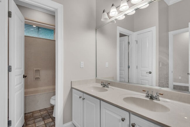 Building Photo - MOVE IN SPECIAL: 30% OFF FIRST MONTHS RENT -- Spacious unfurnished 4B/3B home in Gated Community ...