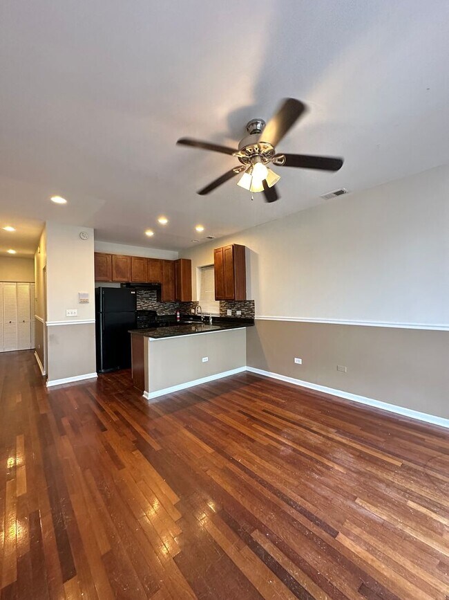 Building Photo - 7654 S Colfax Ave