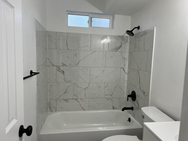 Tiled shower/bath - 18221 W 3rd Pl