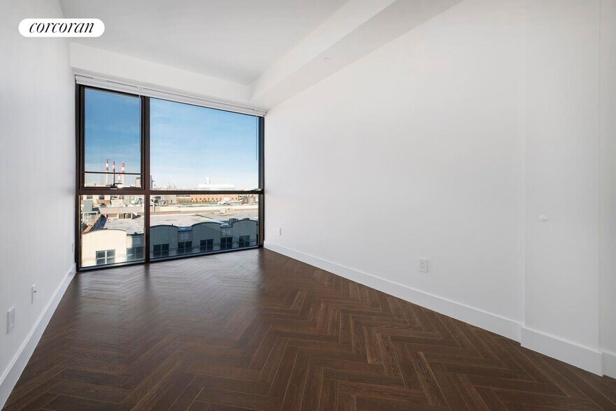 Building Photo - 11-12 44th Drive 6G