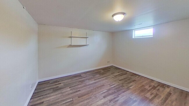 Building Photo - Updated two bedroom ranch duplex with partial basement finish, detached garage, close to mall/sho...