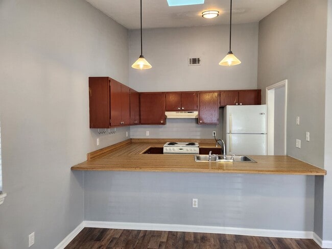 Building Photo - Remodeled 2 bedroom duplex with all wood floors for rent May 6, 2026 for $1350 per month