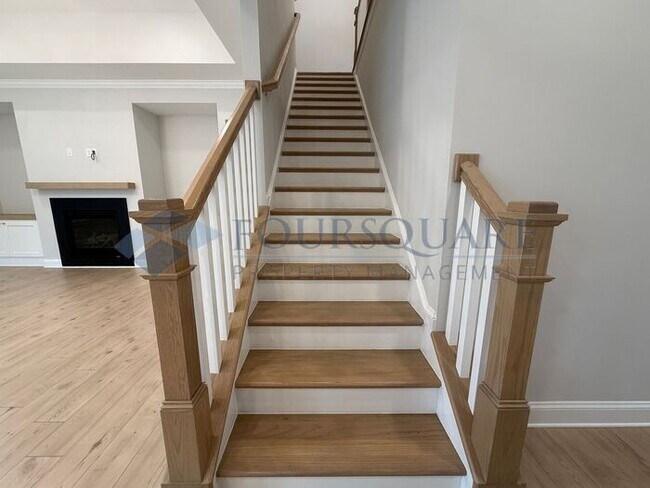 Building Photo - Elegant 4-Bed / 3.5-Bath Home with Main-Level Primary Suite, Quartz Kitchen & 3-Car Garage – In H...