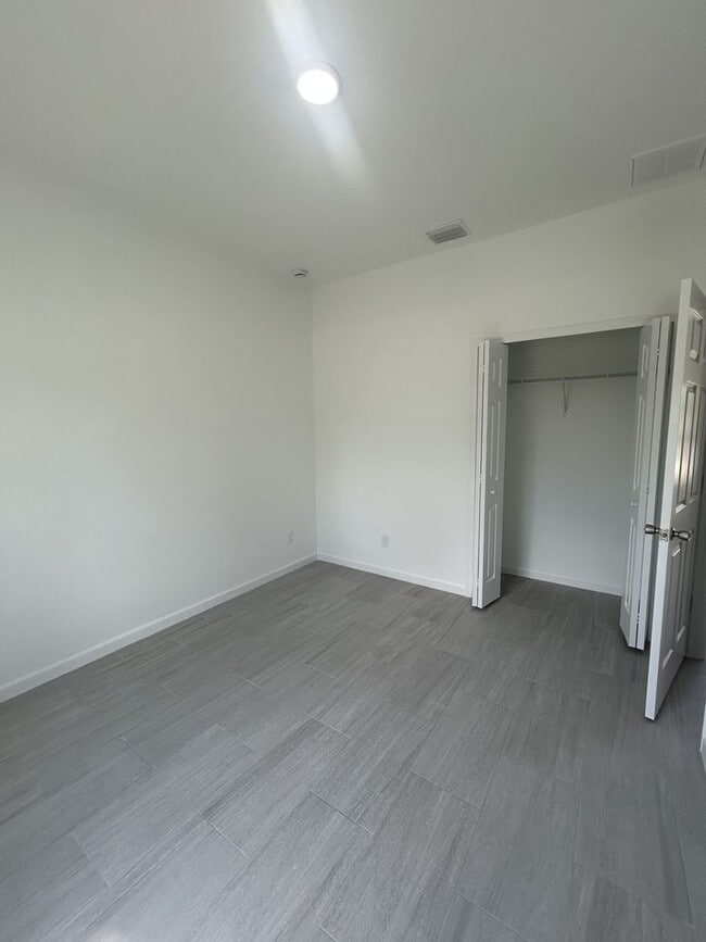 Building Photo - NEW CONSTRUCTION! Modern 3BR/2BA Home with Garage-Peaceful Lake Placid Location