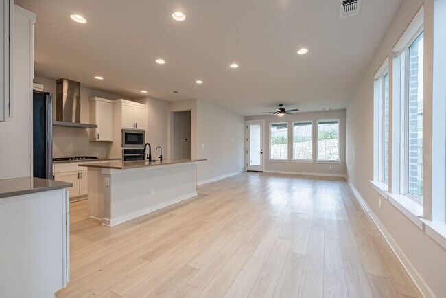 Building Photo - Spacious Buda Beauty Offering Open-Concept Living and Flexible Space for Every Lifestyle!