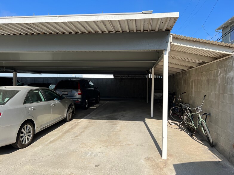 Two tandem covered, secured parking spaces - 22 Navy St