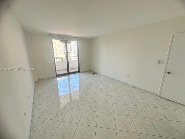 Building Photo - 5555 Collins Ave