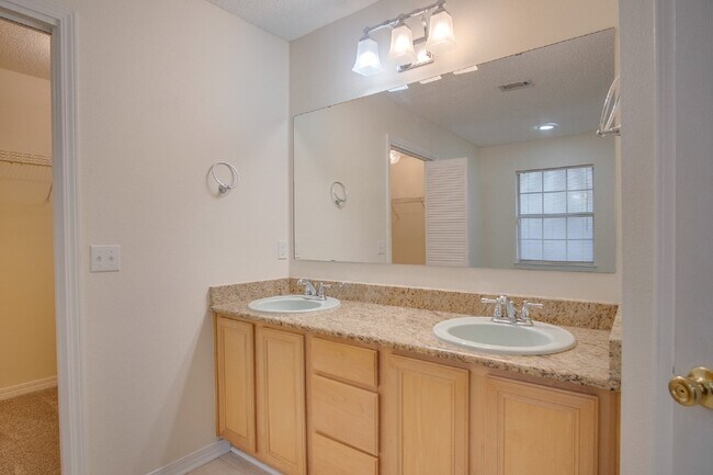 Building Photo - Updated 4BR/3BA Brick Home Near NAS Pensacola with Office & Screened Porch