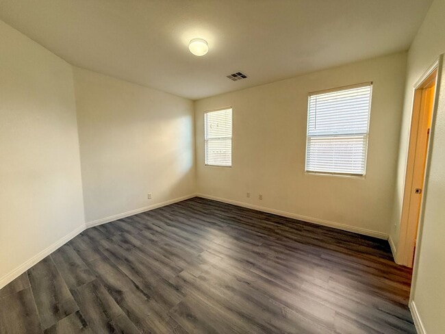 Building Photo - SPACIOUS HOME IN GATED COMMUNITY WITH POOL, RV PARKING & 4-CAR GARAGE!