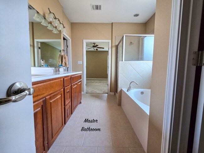 Complete with double sinks, it provides a perfect blend of comfort and style. - 301 Silver Trl