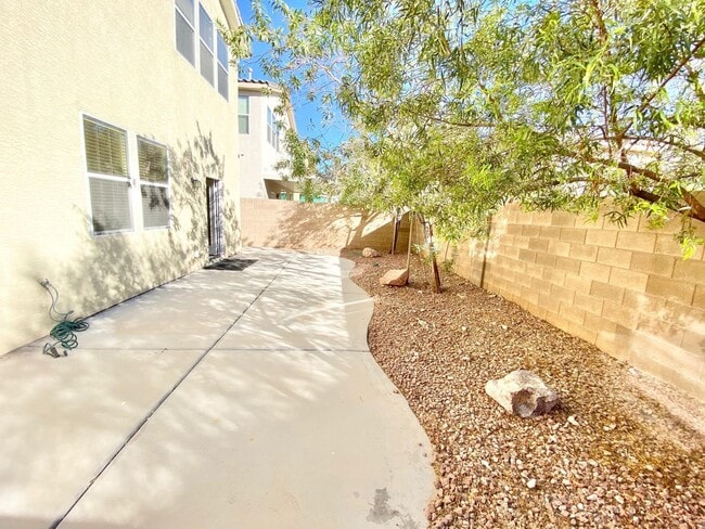 Building Photo - THIS SPACIOUS RESIDENCE FEATURES 4 BEDROOM...