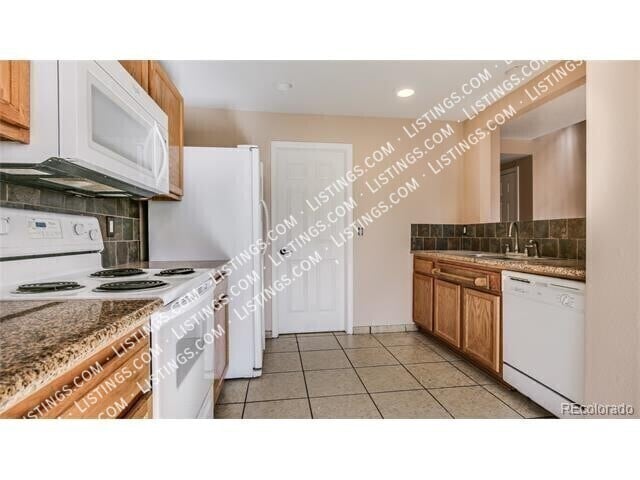 Building Photo - 7913 S Kalispell Way