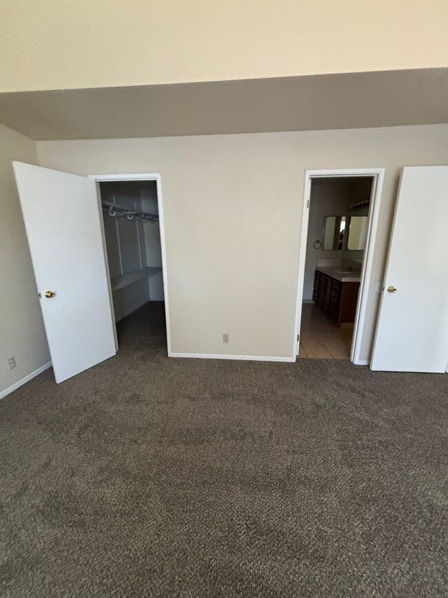 Building Photo - Spacious 4-Bedroom Home with Community Poo...