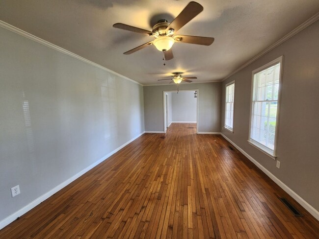 Building Photo - Charming 3BR/2BA Brick Home with Vintage Flair, Expansive Backyard & Walk to VSU!