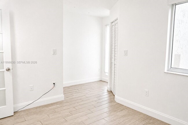 Building Photo - 8695 NW 6th Ln