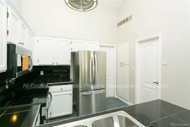 Building Photo - 9617 W Chatfield Ave