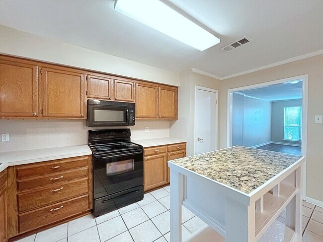 Building Photo - Prime 3 Bed, 2.5 Bath with Fireplace & Fenced Patio!