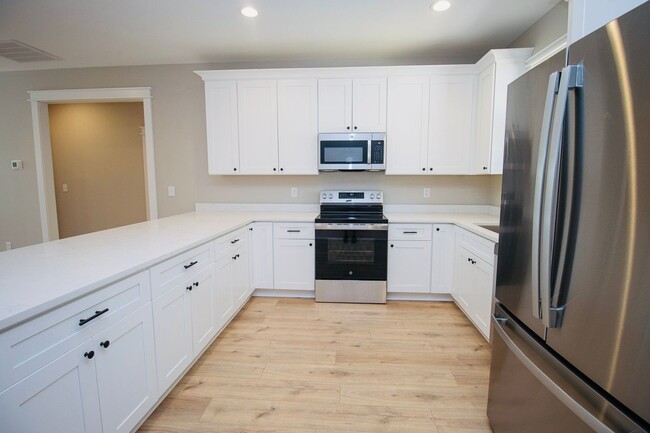 Building Photo - "Welcome to Olympia – Brand New Units + $4...