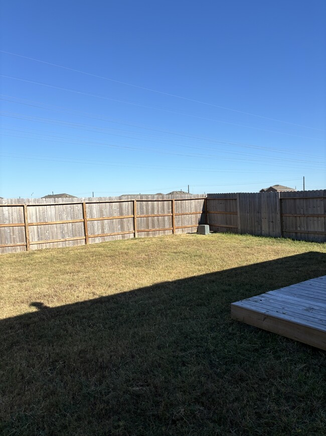 Fenced-in backyard - 9130 Burnet Fields Dr