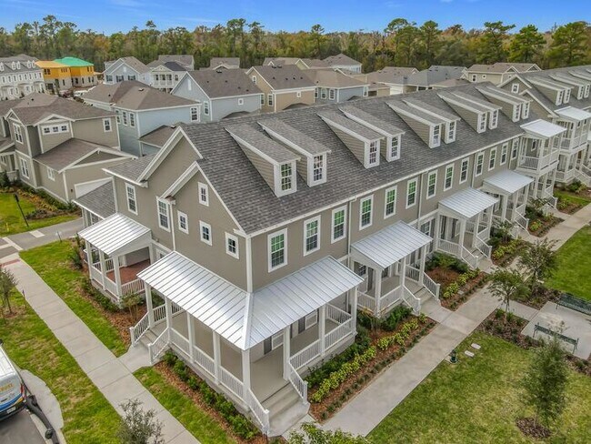 Building Photo - Brand New Luxury Town House in Island Village a Celebration, FL maintenance free community.