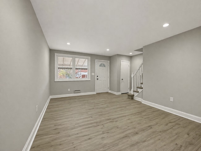 Building Photo - Updated 3BR Home with Bonus Lower-Level Space & Off-Street Parking