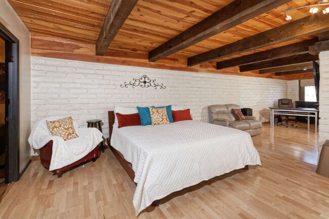 Building Photo - One-of-a-kind adobe brick home backing up ...