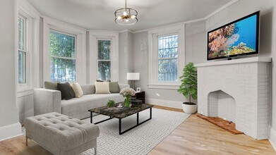 Building Photo - Spacious 4-Bedroom, 2-Bathroom Apartment i...