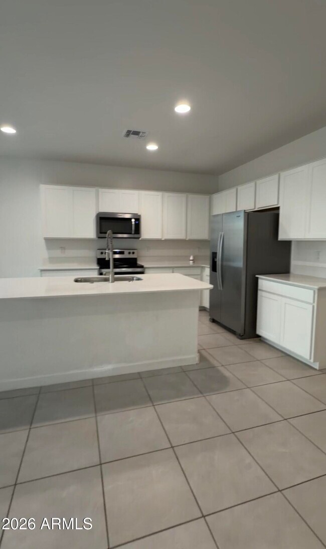 Building Photo - 24066 W Flores Dr