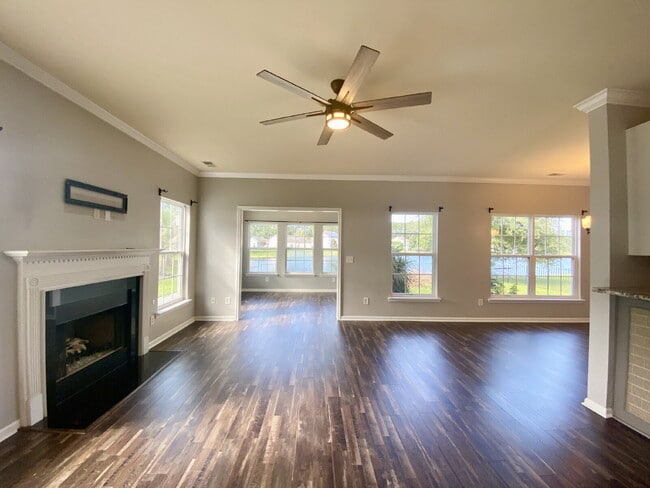 Building Photo - Three Bedroom Home with fenced-in Backyard oasis!