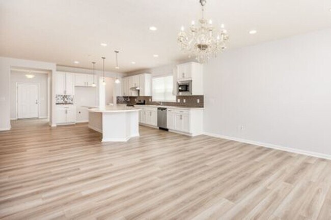 Building Photo - Updated 3-Bedroom Home with 3 Baths, Open-Concept Layout, Luxury Flooring & Bright Modern Kitchen