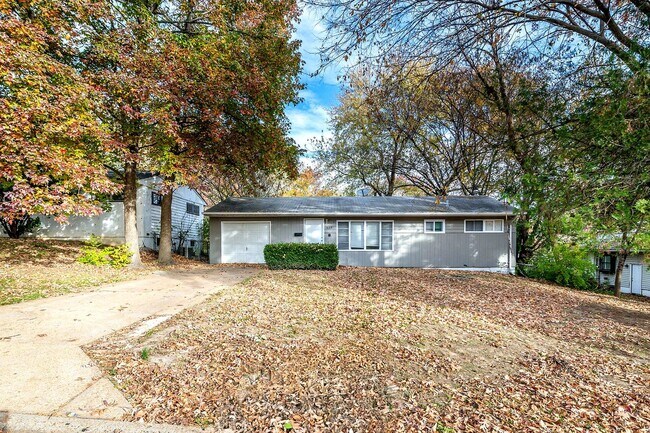 Primary Photo - Charming Mid-Century Home with Basement and Fenced Backyard!