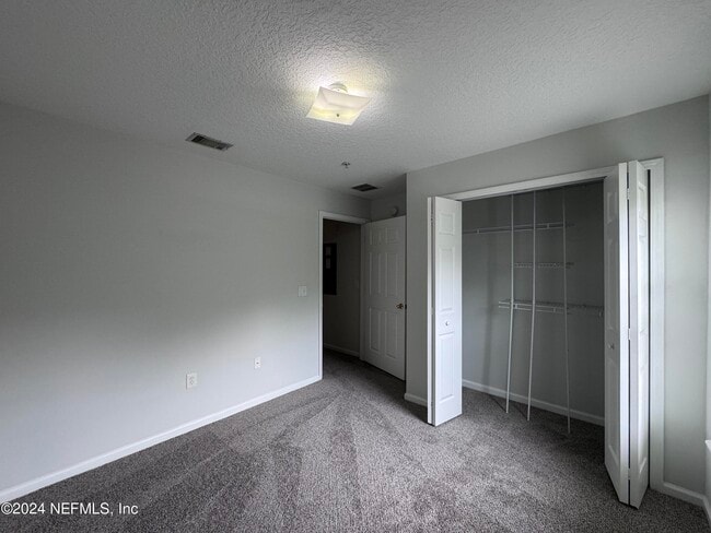 Building Photo - 6985 Ortega Woods Dr