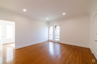 Building Photo - A Grand, Light-Filled 1-Bedroom with Bonus...