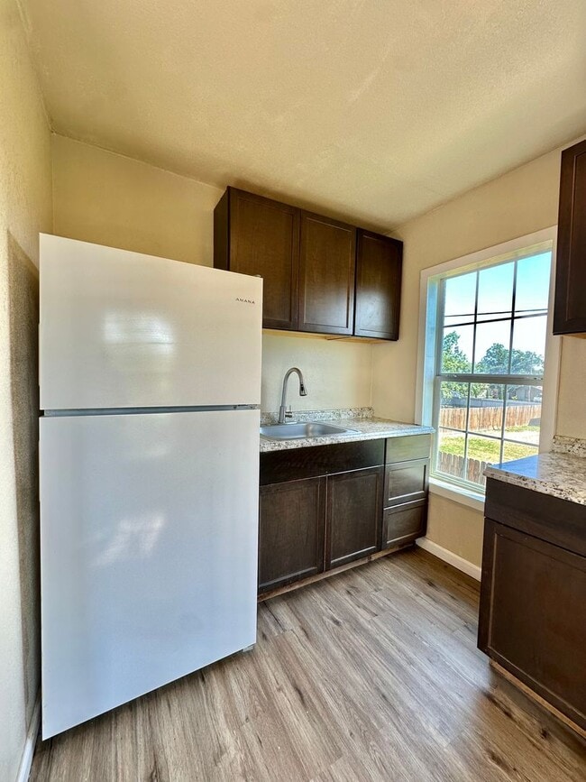 Building Photo - COMING SOON - Remodeled 1 Bedroom Apartment + Water/Sewer/Trash Included!