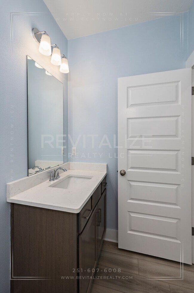 Building Photo - HALF-DEPOSIT SPECIAL! Charming Gold Fortified Home in Live Oak Estates – Near Downtown Fairhope!