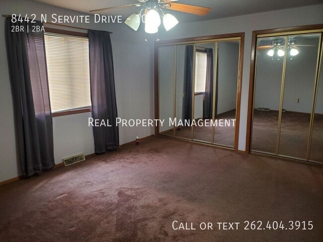 Building Photo - 8442 N Servite Dr