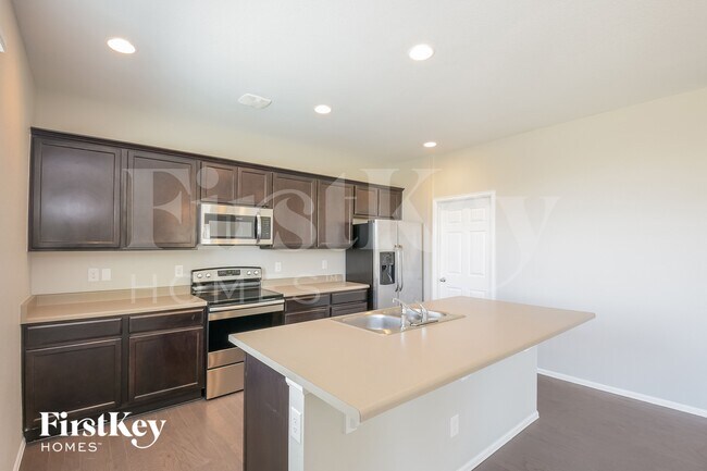 Building Photo - 6481 N Dunkirk Ct